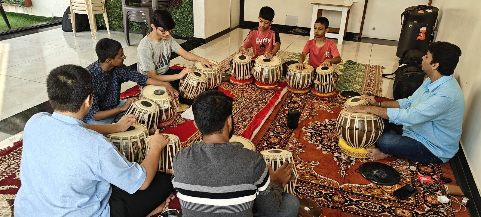 Students at a group tabla lesson