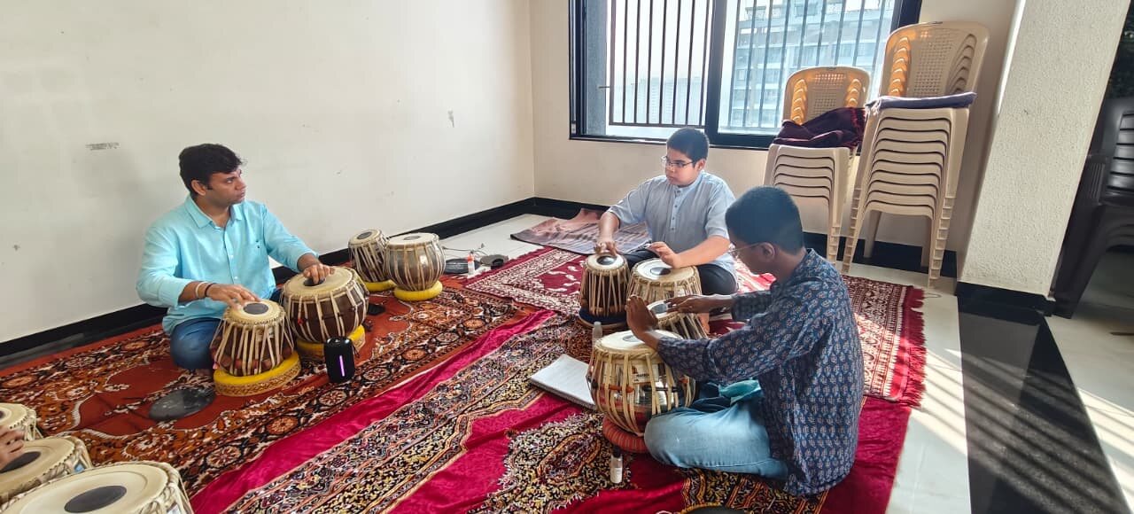 A tabla lesson in progress